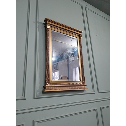 183 - Gilt wall mirror in the Victorian style. {101 cm H x 71 cm W}.