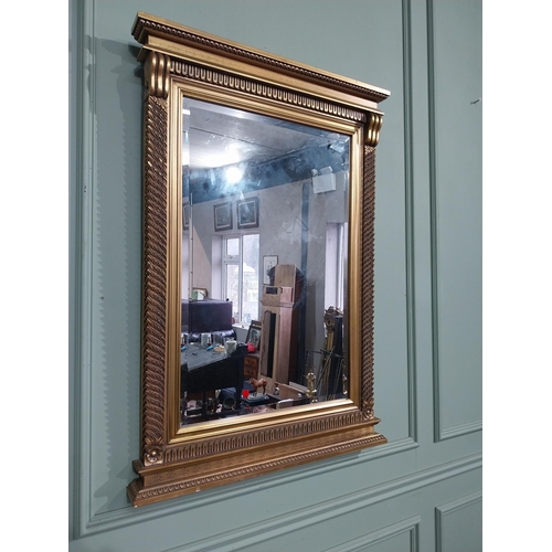 183 - Gilt wall mirror in the Victorian style. {101 cm H x 71 cm W}.