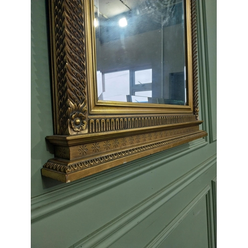 183 - Gilt wall mirror in the Victorian style. {101 cm H x 71 cm W}.