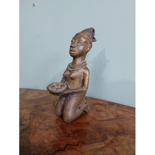 190 - African Benin bronze sculpture. {19 cm H x 8 cm W x 11 cm D}.