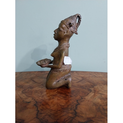 190 - African Benin bronze sculpture. {19 cm H x 8 cm W x 11 cm D}.