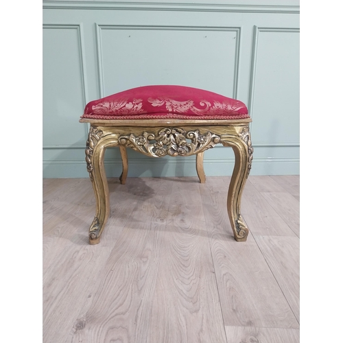 204 - French gilt wood and upholstered foot stool on cabriole legs. {54 cm H x 95 cm W x 66 cm D}.