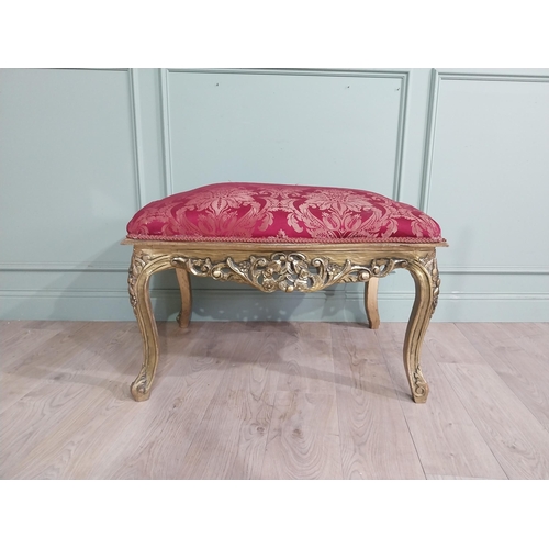 204 - French gilt wood and upholstered foot stool on cabriole legs. {54 cm H x 95 cm W x 66 cm D}.