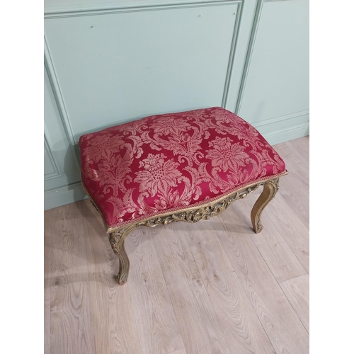 204 - French gilt wood and upholstered foot stool on cabriole legs. {54 cm H x 95 cm W x 66 cm D}.