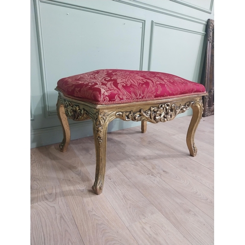 204 - French gilt wood and upholstered foot stool on cabriole legs. {54 cm H x 95 cm W x 66 cm D}.