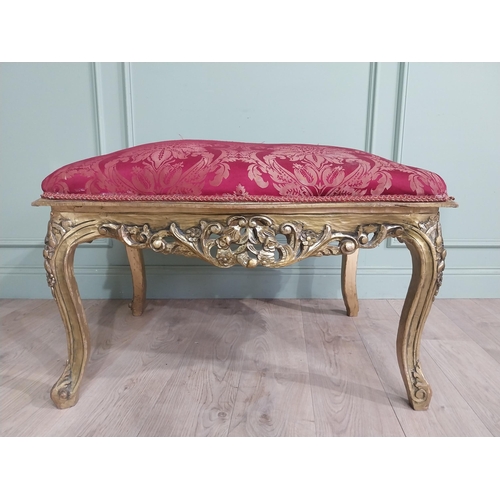 204 - French gilt wood and upholstered foot stool on cabriole legs. {54 cm H x 95 cm W x 66 cm D}.