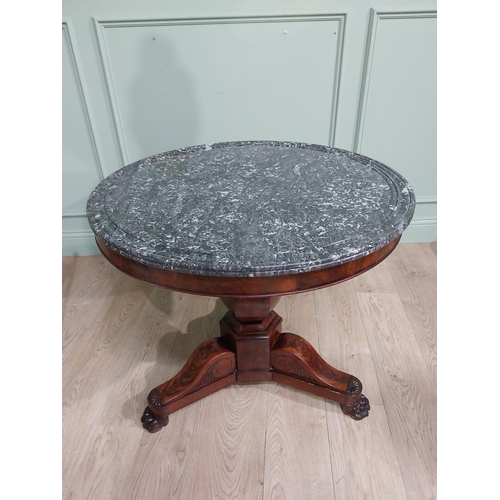 205 - Good quality William IV French mahogany centre table with marble top on turned column and three carv... 