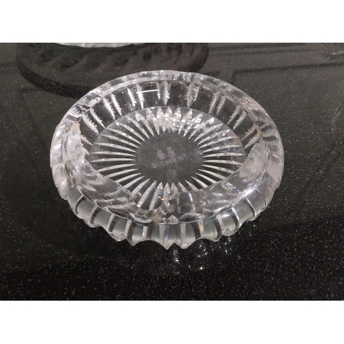 207 - Cut glass bowl {32 cm Dia}, ashtray {18 cm Dia} and three trays. {20 cm Dia.}