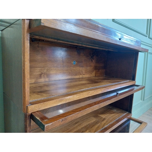 21 - Edwardian Globe Wernicke Ltd three piece oak glazed stackable bookcase. {105 cm H x 85 cm W x 28 cm ... 