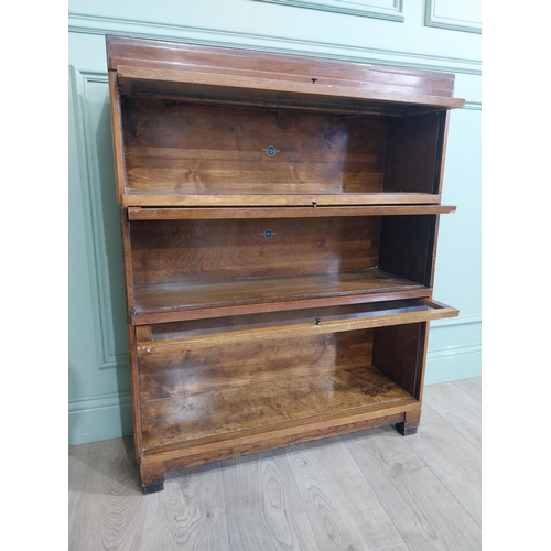 21 - Edwardian Globe Wernicke Ltd three piece oak glazed stackable bookcase. {105 cm H x 85 cm W x 28 cm ... 