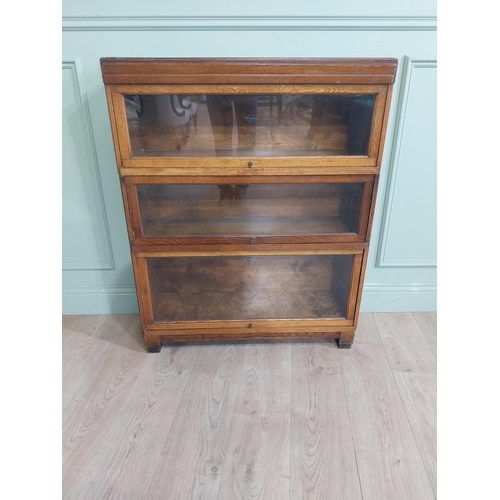 21 - Edwardian Globe Wernicke Ltd three piece oak glazed stackable bookcase. {105 cm H x 85 cm W x 28 cm ... 