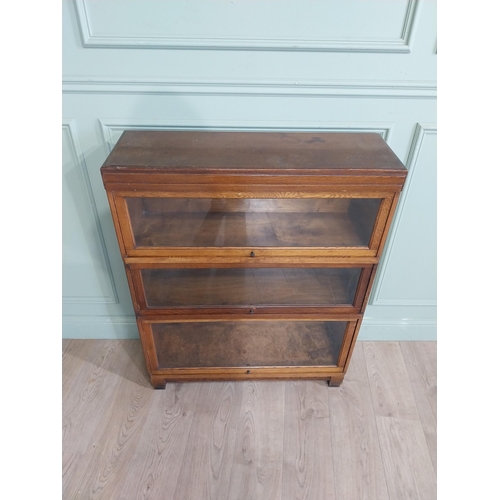 21 - Edwardian Globe Wernicke Ltd three piece oak glazed stackable bookcase. {105 cm H x 85 cm W x 28 cm ... 