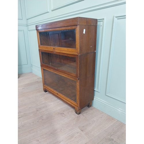 21 - Edwardian Globe Wernicke Ltd three piece oak glazed stackable bookcase. {105 cm H x 85 cm W x 28 cm ... 