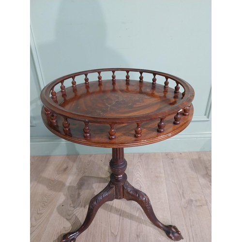 212 - Mahogany ship�s table  with gallery top on single turned column on tripod base with claw and ball fe... 