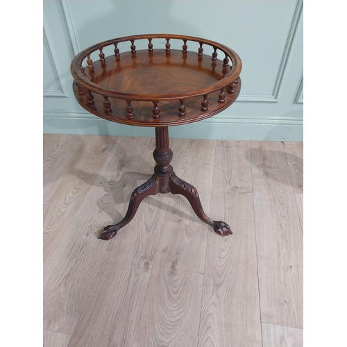 212 - Mahogany ship�s table  with gallery top on single turned column on tripod base with claw and ball fe... 