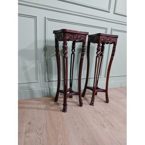 213 - Pair of carved hardwood oriental jardiniere stands with marble tops. {93 cm H x 30 cm W x 30 cm D}.