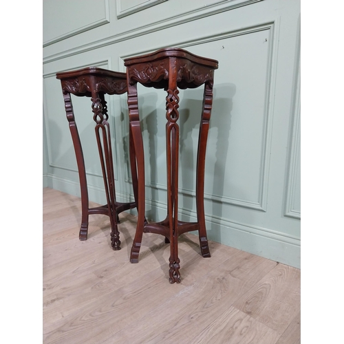 213 - Pair of carved hardwood oriental jardiniere stands with marble tops. {93 cm H x 30 cm W x 30 cm D}.