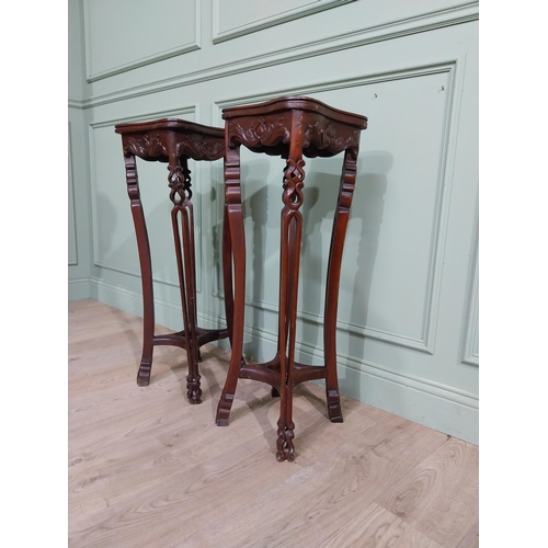 213 - Pair of carved hardwood oriental jardiniere stands with marble tops. {93 cm H x 30 cm W x 30 cm D}.