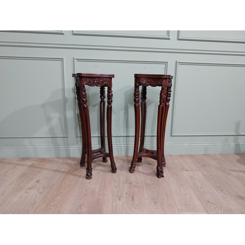 213 - Pair of carved hardwood oriental jardiniere stands with marble tops. {93 cm H x 30 cm W x 30 cm D}.