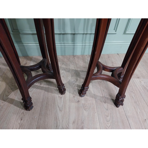 213 - Pair of carved hardwood oriental jardiniere stands with marble tops. {93 cm H x 30 cm W x 30 cm D}.