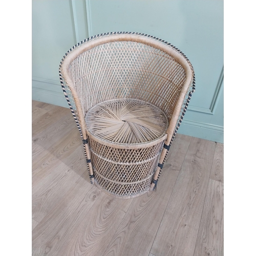 216 - Mid century wicker armchair in the Elena Salmistraro manner. {80 cm H x 60 cm W x 50 cm D}.