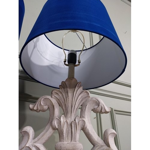 22 - Pair of vintage style painted table lamps with blue cloth shades. {68 cm H x 33 cm Dia.}.