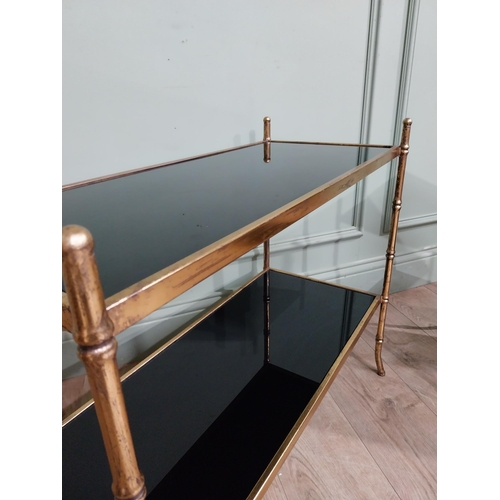 221 - Pair of good quality gilded metal and smoked glass faux bamboo side tables in the Maison Jansen styl... 