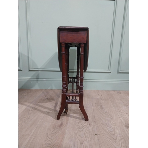 222 - Edwardian mahogany drop leaf Sutherland table. {61 cm H x 60 cm W x 22 cm D}