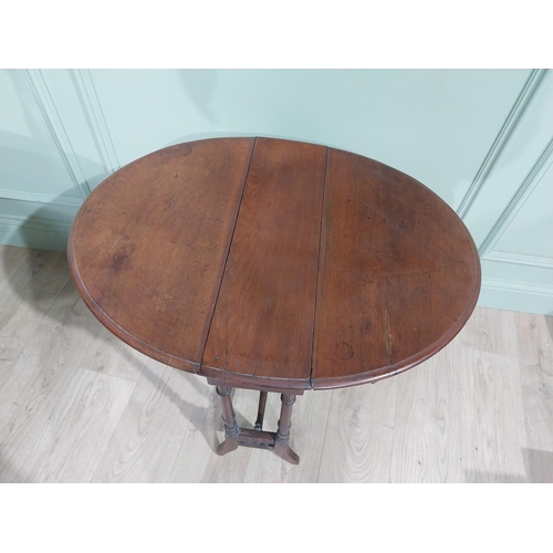 222 - Edwardian mahogany drop leaf Sutherland table. {61 cm H x 60 cm W x 22 cm D}