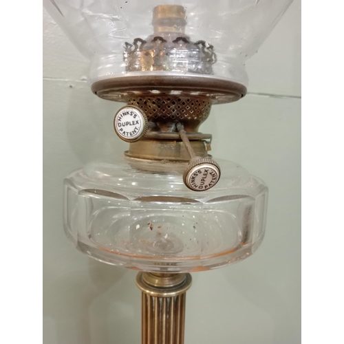 226 - Brass oil lamp with reeded column and glass bowl and shade. {H 72cm x Dia 19cm}.  NOT AVAILABLE TO V... 