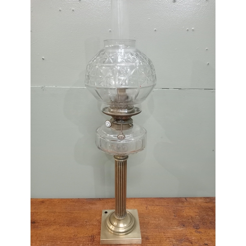 226 - Brass oil lamp with reeded column and glass bowl and shade. {H 72cm x Dia 19cm}.  NOT AVAILABLE TO V... 