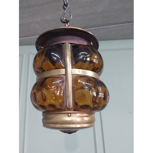 228 - Art Nouveau brass and carnival glass hanging light. {30 cm H x 17 cm Dia.}.