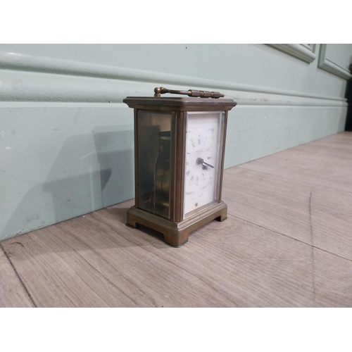 229 - Edwardian brass carriage clock by Bayard Paris. {12 cm H x 8 cm W x 6 cm D}.