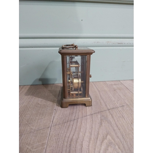 229 - Edwardian brass carriage clock by Bayard Paris. {12 cm H x 8 cm W x 6 cm D}.