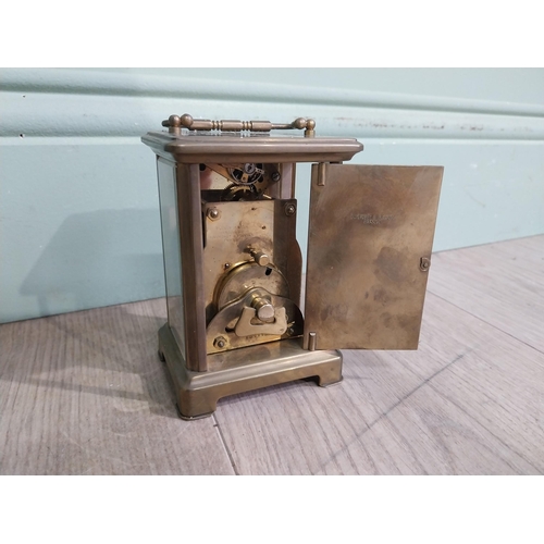 229 - Edwardian brass carriage clock by Bayard Paris. {12 cm H x 8 cm W x 6 cm D}.