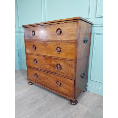 23 - 19th C. Camphorwood campaign chest with four long drawers on turned bun feet. {122 cm H x 116 cm W x... 