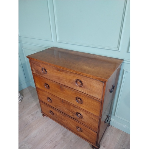 23 - 19th C. Camphorwood campaign chest with four long drawers on turned bun feet. {122 cm H x 116 cm W x... 