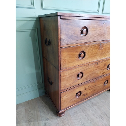 23 - 19th C. Camphorwood campaign chest with four long drawers on turned bun feet. {122 cm H x 116 cm W x... 