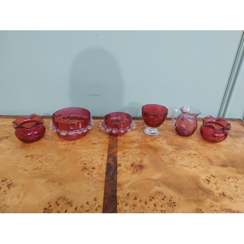 233 - Six pieces of Victorian ruby glass bowls and jug. {9 cm H to 7 cm H}