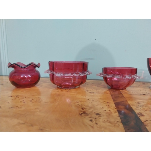 233 - Six pieces of Victorian ruby glass bowls and jug. {9 cm H to 7 cm H}