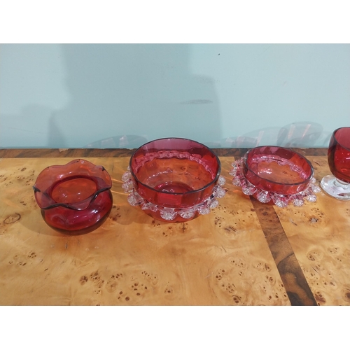 233 - Six pieces of Victorian ruby glass bowls and jug. {9 cm H to 7 cm H}