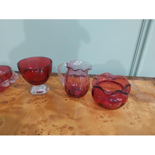 233 - Six pieces of Victorian ruby glass bowls and jug. {9 cm H to 7 cm H}