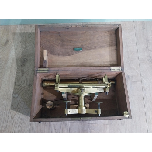 24 - Early 20th C. Brass theodolite in camphor wood case. {15 cm H x 40 cm W x 21 cm D].