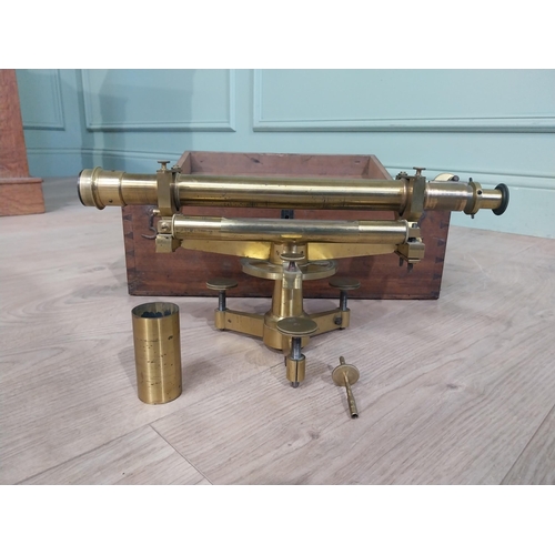 24 - Early 20th C. Brass theodolite in camphor wood case. {15 cm H x 40 cm W x 21 cm D].