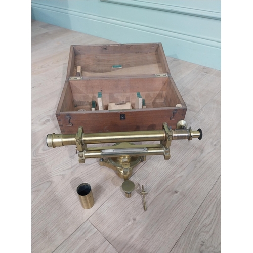 24 - Early 20th C. Brass theodolite in camphor wood case. {15 cm H x 40 cm W x 21 cm D].