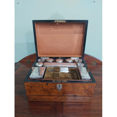 252 - 19th C. Walnut travelling vanity box with fitted interior and contents with glass silver plated  top... 