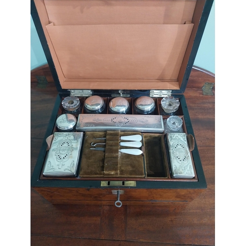 252 - 19th C. Walnut travelling vanity box with fitted interior and contents with glass silver plated  top... 