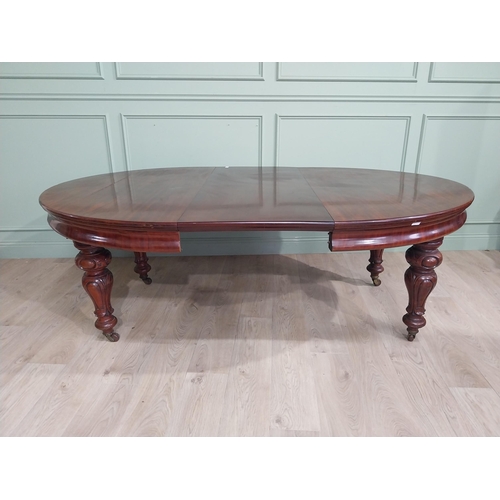 254 - Victorian mahogany D end dining table on four turned legs and brass castors. {73 cm H x 210 cm W x 1... 