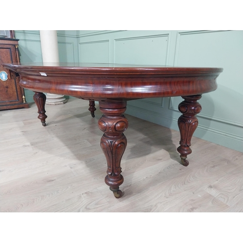 254 - Victorian mahogany D end dining table on four turned legs and brass castors. {73 cm H x 210 cm W x 1... 