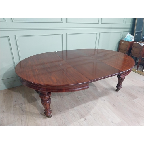 254 - Victorian mahogany D end dining table on four turned legs and brass castors. {73 cm H x 210 cm W x 1... 